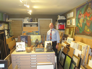 Albert Shahinian in his “store room” that houses so many of the fine art works he shows at his gallery in Rhinebeck, NY