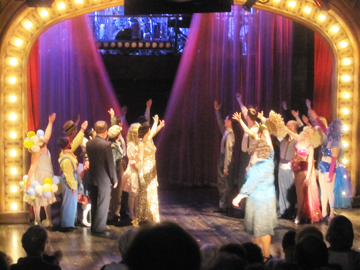 Cast of Gypsy saluting the musians at the curtain call.