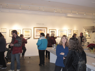 Betsy Jacaruso (center facing) at an opening at her studio  in Rhinebeck, NY