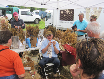 One of the Garlic growers giving us a lesson in growing and harveting garlic