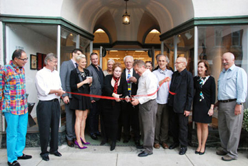 Renaissance Art & Collectibles grand opening celebration ribbon cutting with gallery owner Libertad M deBoisblan and Catskill Chamber of Commerce President Jeff Friedman