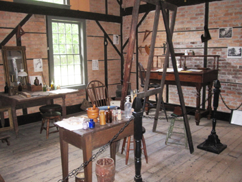 Raymond J. Seiner and visitors to his studio