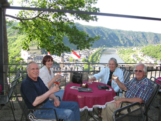 Jörg Iwan, Jacky Sparkowsky, Cornelia Seckel, Raymond J. Steiner overlooking the Mosel from the Reichburg Castle in Cochem, Germany        from the Reichburg Castle in Cochem, Germany