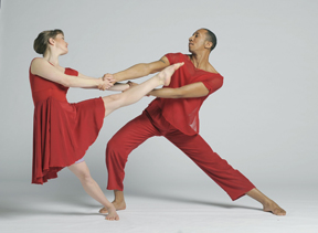 The duet is of Laura Teeter and Andre Robles from the piece "A Gathering in Red, Departing" from The Ellen Sinopoli Dance Company .  Photo Gary Gold